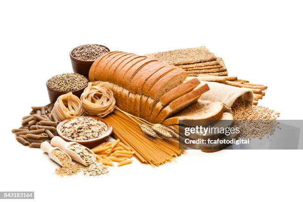 wholegrain and dietary fiber food on white background - cereais de pequeno almoço imagens e fotografias de stock