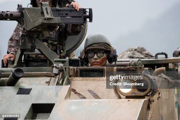South Korean soldiers travel in an armored vehicle along a road near the border in Paju, South Korea, on Wednesday, Sept. 6, 2017. North Korean has...