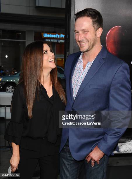Actress Tiffani Thiessen and husband Brady Smith attend the premiere of "It" at TCL Chinese Theatre on September 5, 2017 in Hollywood, California.