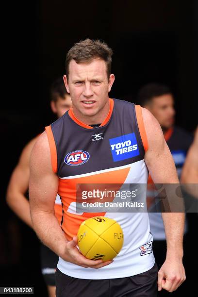 Steve Johnson of the Giants walks onto the field during a Greater Western Sydney Giants AFL training session at Adelaide Oval on September 6, 2017 in...
