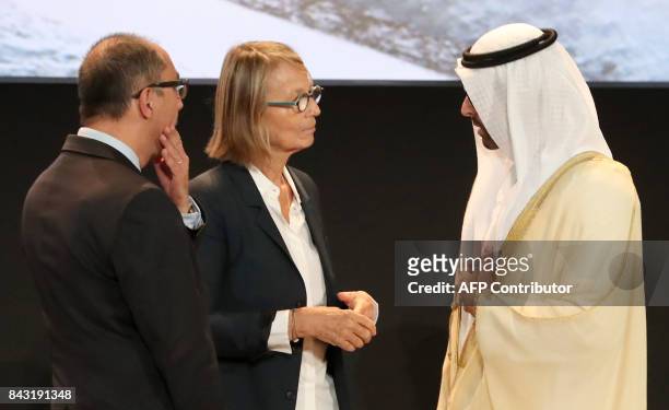 French Minister of Culture Francoise Nyssen speaks with Mohamed Khalifa Al-Mubarak chairman of Abu Dhabi Tourism and Jean-Luc Martinez, president of...