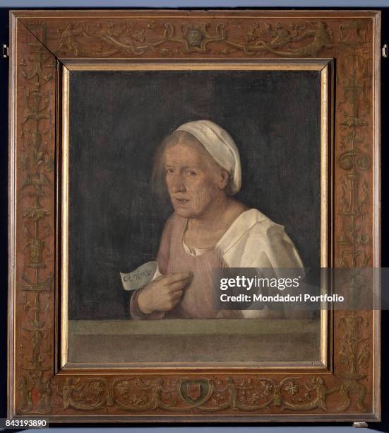 Italy, Veneto, Venice, Accademia Art Galleries. Whole artwork view. Old womans face white hat gray hair.