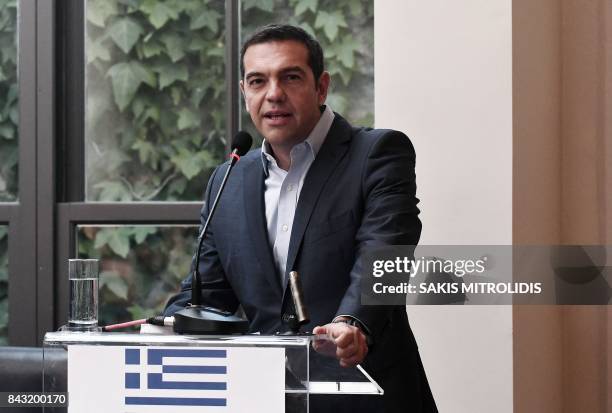 Greek Prime Minister Alexis Tsipras delivers a speech during a ceremony on the signing of a bilateral agreement between Greece and Bulgaria to speed...