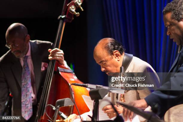 From left, American Jazz musicians Ron Carter, on upright bass, Benny Golson, on saxophone, and Wallace Roney , perform onstage at the Blue Note...