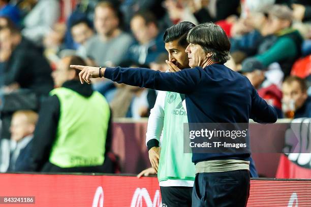 Emre Can of Germany speak with Head coach Jochaim Loew of Germany during the FIFA 2018 World Cup Qualifier between Czech Republic and Germany at Eden...