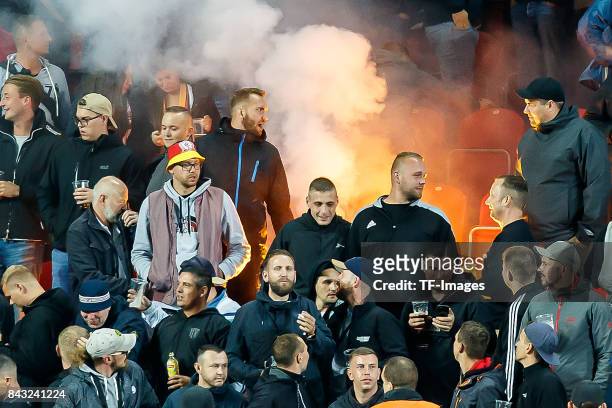 Fans of FC Germany fire up bengalo / pyro / firework during the FIFA 2018 World Cup Qualifier between Czech Republic and Germany at Eden Stadium on...