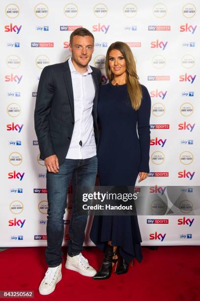 In this handout image provided by Sky, Footballer Jamie Vardy poses with his wife Rebekah Vardy as they attend the premiere of "The Next Jamie Vardy"...