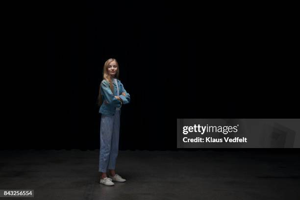 girl wearing denim jacket, smilling at looking up in camera - denim jacket bildbanksfoton och bilder