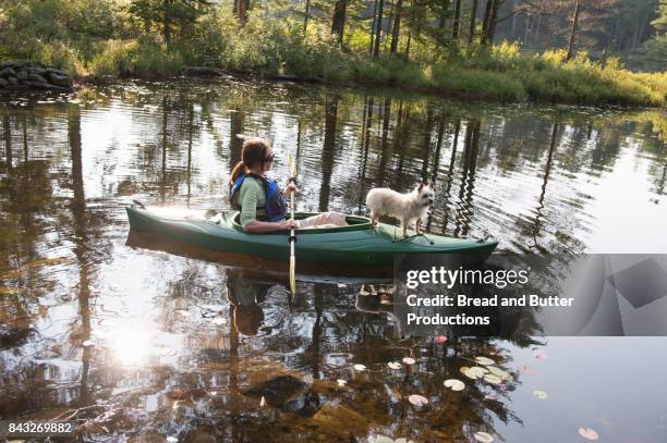 woman kayaking with her dog - londonderry new hampshire ストックフォトと画像