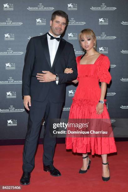 Deputy CEO of Jaeger-LeCoultre Geoffroy Lefebvre and Margaret Zhang arrive for the Jaeger-LeCoultre Gala Dinner during the 74th Venice International...