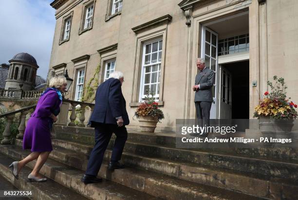 The Prince of Wales, known as the Duke of Rothesay in Scotland, welcomes President of Ireland Michael D Higgins and his wife Sabina to Dumfries House...