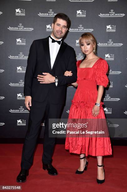 Deputy CEO of Jaeger-LeCoultre Geoffroy Lefebvre and Margaret Zhang arrive for the Jaeger-LeCoultre Gala Dinner during the 74th Venice International...