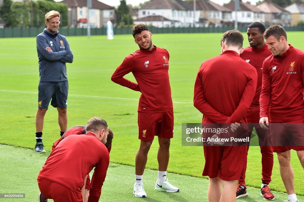 Alex Oxlade-Chamberlain Of Liverpool FC Trains At Melwood For The First Time