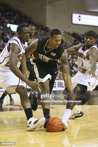 Wake Forest James Johnson in action vs Boston College Reggie Jackson and Tyrese Rice . Chestnut Hill, MA 1/14/2009 CREDIT: Damian Strohmeyer