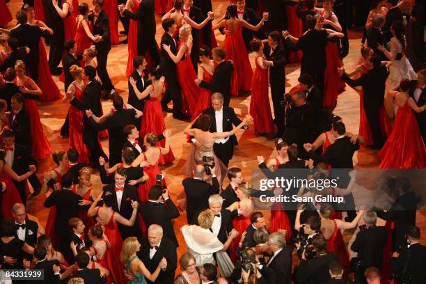 Governor of Saxony Stanislaw Tillich and his wife Veronika dance the opening waltz with debutantes and their escorts at the Semper Opera Ball on...