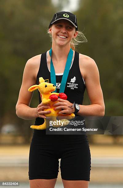 Leah Stanley of New Zealand smiles on the podium after winning gold in the womens single sculls final during day four of the Australian Youth Olympic...