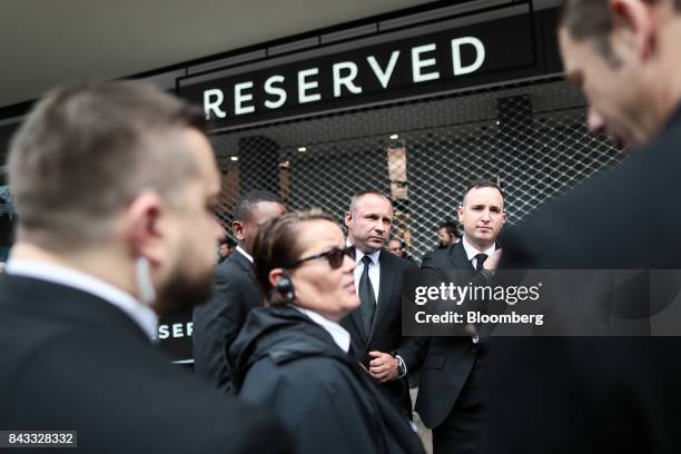 Security prepare for the arrival of British fashion model Kate Moss and the opening of London's first Reserved store, operated by LPP SA, on Oxford...