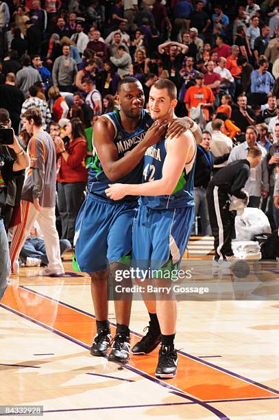 Al Jefferson and Kevin Love of the Minnesota Timberwolves celebrate their victory over the Phoenix Suns in an NBA game played on January 16 at U.S....