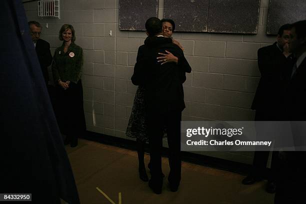 Democratic presidential hopeful U.S Senator Barack Obama and his wife Michelle Obama backstage before going out to face their supporters at a primary...