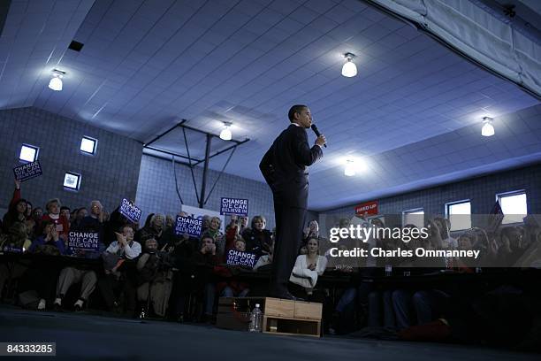 Democratic Presidential hopeful Senator Barack Obama speaks to voters from a makeshift soapbox-style podium during a rally at Friendly House...