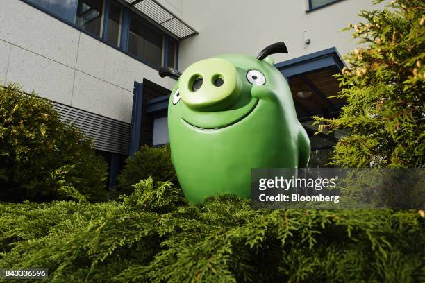 Model of Angry Birds character 'Bad Piggie' sits on display outside the headquarters of Rovio Entertainment Oy in Espoo, Finland, on Wednesday, Sept....