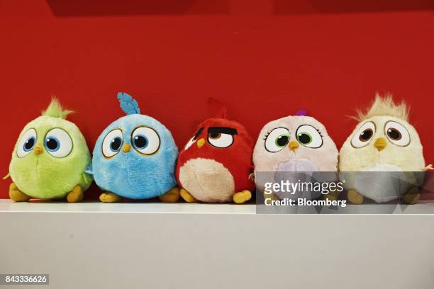 Consumer products of Angry Birds characters sit on display in the reception area at the headquarters of Rovio Entertainment Oy in Espoo, Finland, on...