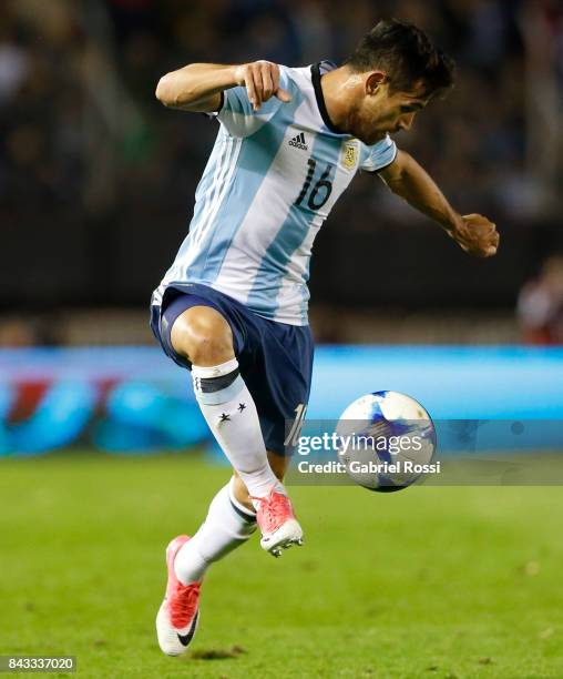Lautaro Acosta of Argentina controls the ball during a match between Argentina and Venezuela as part of FIFA 2018 World Cup Qualifiers at Monumental...