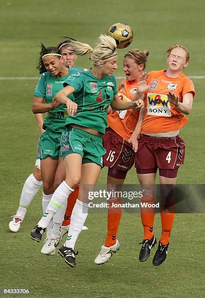 Grace Gill of Canberra and Clare Polkinghorne of the Roar contest the ball during the W-League 2009 Grand Final match between the Queensland Roar and...