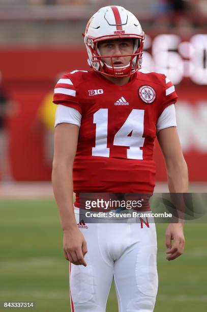 Quarterback Tristan Gebbia of the Nebraska Cornhuskers warms up before the game against the Arkansas State Red Wolves at Memorial Stadium on...
