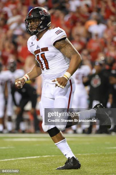 Defensive end Ja'Von Rolland-Jones of the Arkansas State Red Wolves awaits a snap against the Nebraska Cornhuskers at Memorial Stadium on September...