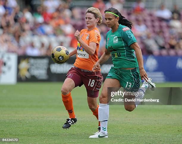 Courtney Beutel of the Roar and Thea Slatyer of Canberra compete for the ball during the W-League 2009 Grand Final match between the Queensland Roar...