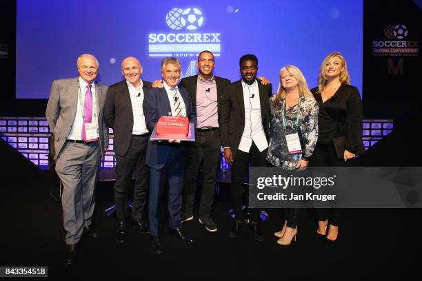 David Dein , The FA former Vice-Chairman poses with a Birthday cake and Tony Martin, Soccerex Chairman, Mike Phelan, Stan Collymore, Kolo Toure, Rita...