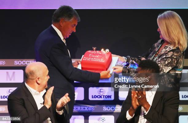 David Dein, The FA former Vice-Chairman is presented with a Birthday cake by Rita Revie, COO of Soccerex during day 3 of the Soccerex Global...