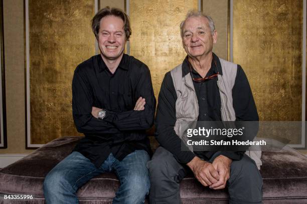 Jan Vogler and Bill Murray pose for a photo during Universal Inside 2017 organized by Universal Music Group at Mercedes-Benz Arena on September 6,...