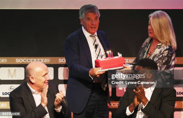 David Dein, The FA former Vice-Chairman is presented with a Birthday cake by Rita Revie, COO of Soccerex during day 3 of the Soccerex Global...