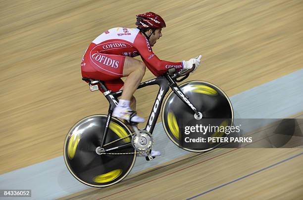 French cyclist Francois Pervis of the Confidis team competes in the mens 1 km TT final during the UCI Track World Cup at Laoshan Velodrome in Beijing...