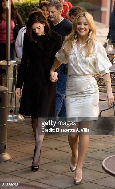 Actresses Anne Hathaway and Kate Hudson arrive at "Bride Wars" photocall at De Russie Hotel on January 17, 2009 in Rome, Italy.