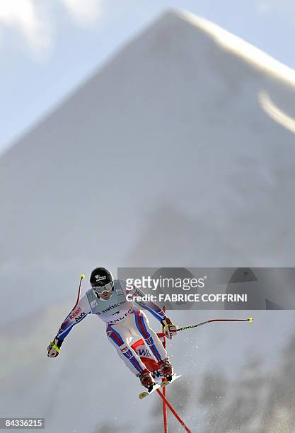 France's David Poisson jumps in front of the Silberhorn on his way to placed 16th in the FIS alpine skiing World Cup men's downhill race on January...