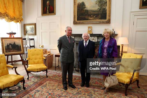 Prince Charles, The Prince of Wales, known as the Duke of Rothesay in Scotland, with the President of Ireland Michael D Higgins and his wife, Sabina...