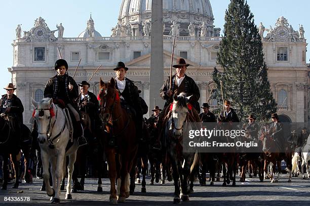 Breeders on Butteri horses arrive to attend mass and a blessing for the Italian Breeders Association at Saint Peter's Square in front of St. Peter's...