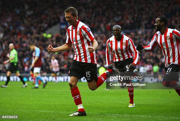 Danny Collins of Sunderland celebrates scoring the first goal during the Barclays Premier League match between Sunderland and Aston Villa at The...