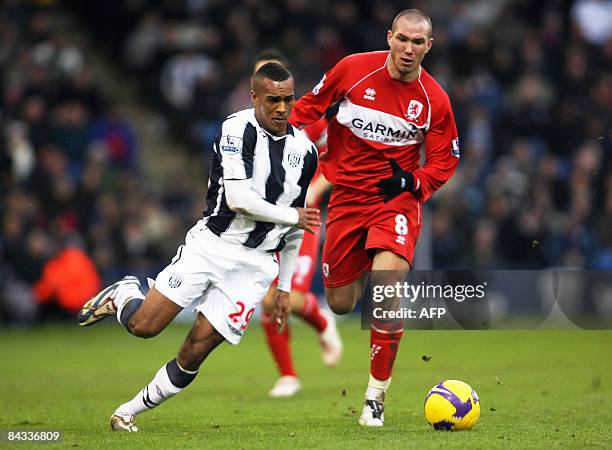 West Bromwich Albion's Jay Simpson is seen in action against Middlesbrough's Didier Digard during their Premiership football match at The Hawthorns...