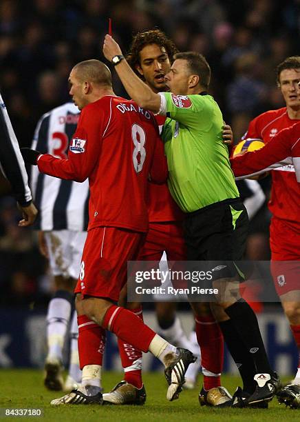 Didier Digard of Middlesbrough is shown a straight red card by referee Mark Halsey during the Barclays Premier League match between West Bromwich...