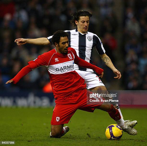 Robert Koren of West Bromwich Albion tackles Mohamed Shawky of Middlesbrough during the Barclays Premier League match between West Bromwich Albion...