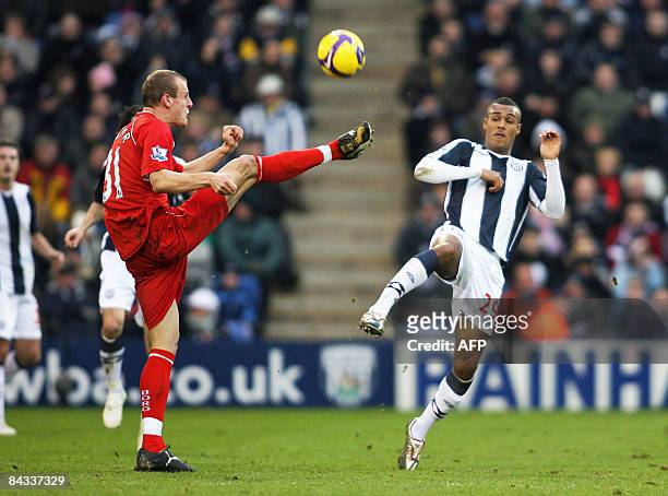 West Bromwich Albion's Jay Simpson kicks the ball as he faces Middlesbrough's David Wheater during their Premiership football match against...