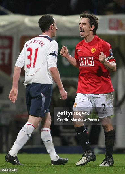 Gary Neville of Manchester United celebrates at the end of the Barclays Premier League match between Bolton Wanderers and Manchester United at The...