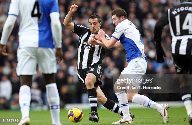 Jose Enrique tangles with Brett Emerton during the Barclays Premier League match between Blackburn Rovers and Newcastle United at Ewood Park on...