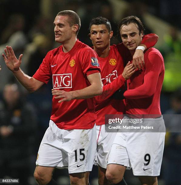 Dimitar Berbatov of Manchester United celebrates scoring their first goal during the Barclays Premier League match between Bolton Wanderers and...