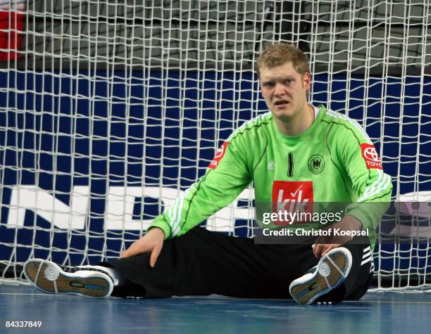 Johannes Bitter of Germany sits on the pitch after he got a goal during the Men's World Handball Championships match between Germany and Russia at...