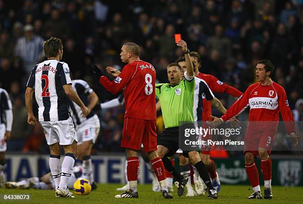 Didier Digard of Middlesbrough is shown a straight red card by referee Mark Halsey during the Barclays Premier League match between West Bromwich...